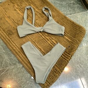 Green ribbed Skatie bathing suit both are size M.